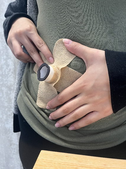 Mohammed sketching product ideas on paper